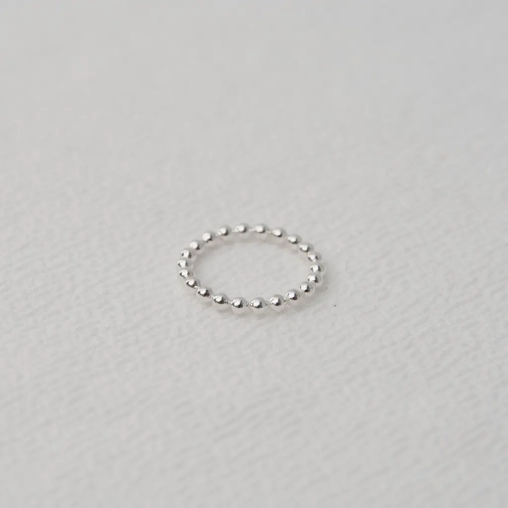 anillo_minimal_bolitas_plata.webp