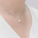dije-flor-perla.webp