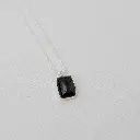 dije_piedra_rectangular_negra.webp