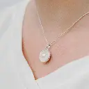 dije_plata_perla.webp