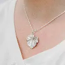 dije_plata_perla_geranio.webp